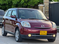 Mazda. Verisa.     2011