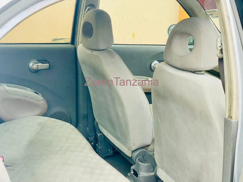 Nissan march.       2004 - 5/5