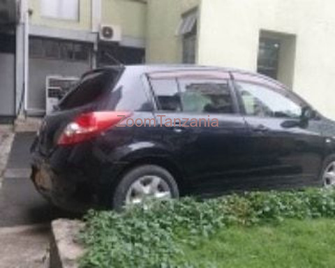 Nissan Tiida.      2005 - 3/6