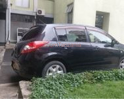 Nissan Tiida.      2005 - 4/6