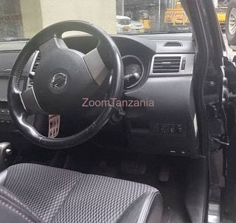 Nissan Tiida.      2005 - 5/6