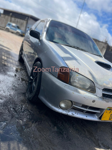 Starlet. Glanza.    2002 - 4/5