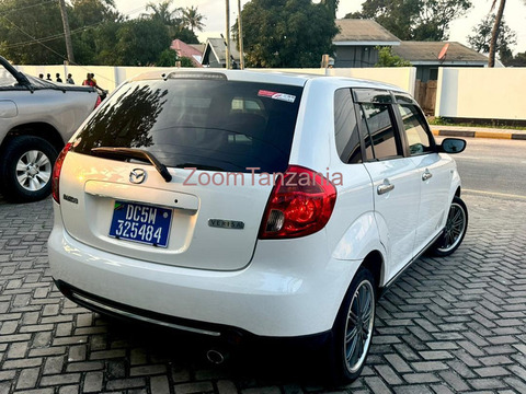 Mazda verisa.     2011 - 5/6