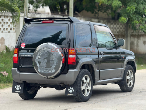 Pajero.  Mini.      2002 - 4/6