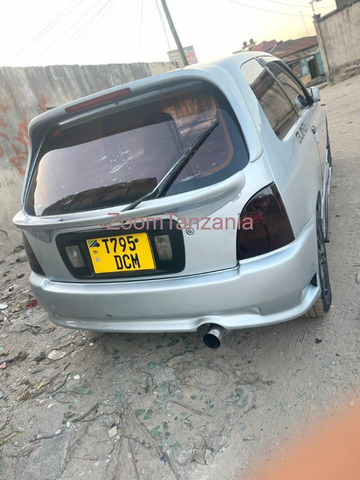 Vitz. Glanza.     2003 - 5/6