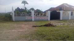 Exceptional Plot with 2 Houses
