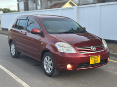2010 Toyota Raum Red