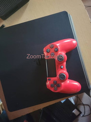 PlayStation 4 Slim with 6 CDs
