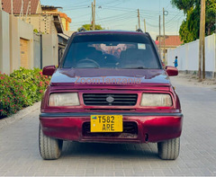 1999 Suzuki Escudo Nyekundu