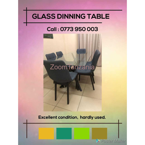 glass dining table with 6 soft cushion grey chairs - 2/2