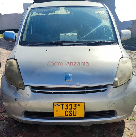 Toyota Passo 2006 Rangi Silver Inauzwa - 2/3