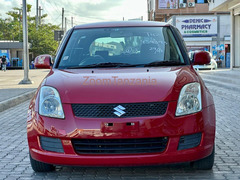 Suzuki Swift 2009 Red Wine Inauzwa